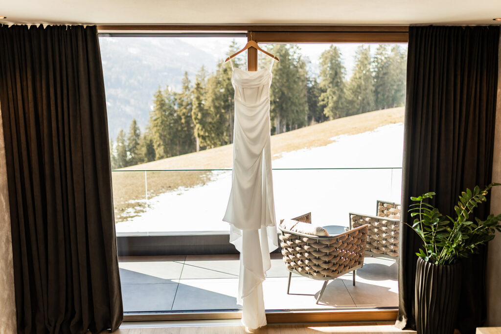 dress hanging from a window