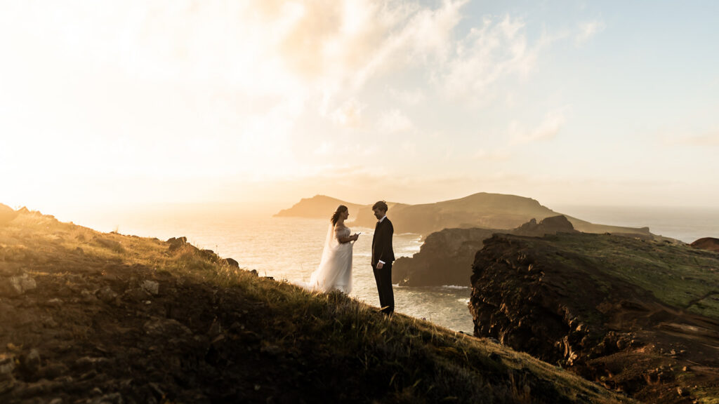 elopement couple exchanging vows on a cliff during during their madeira elopement