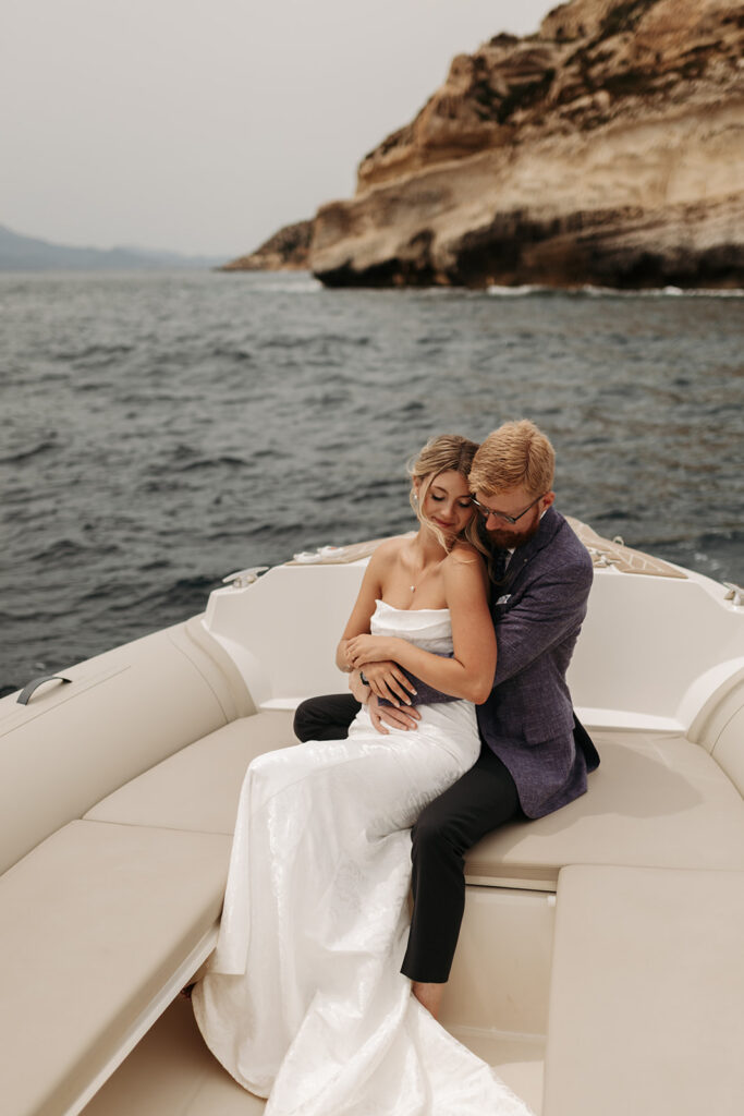 adventurous elopement couple enjoying a boat ride during their sardinia elopement