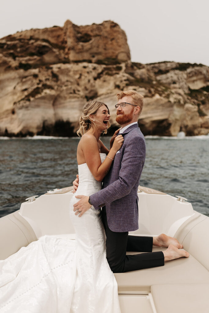 adventurous elopement couple enjoying a boat ride during their sardinia elopement