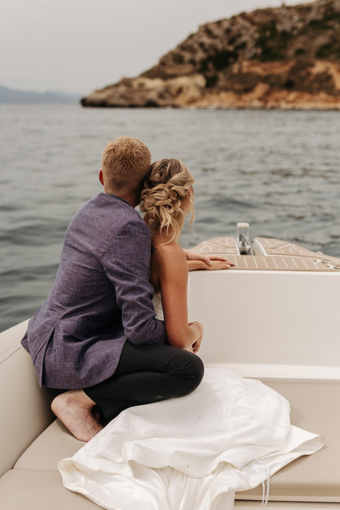 adventurous elopement couple enjoying a boat ride during their sardinia elopement