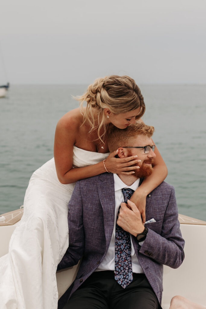 playful bride and groom moments on the boat during their sardinia elopement