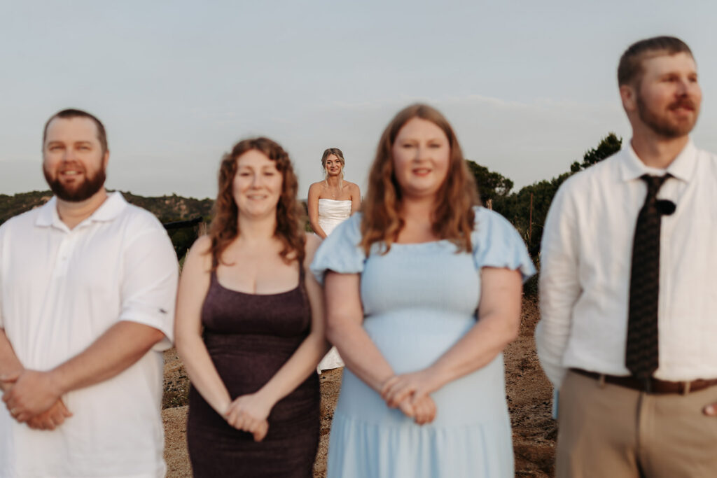 bride and family first look