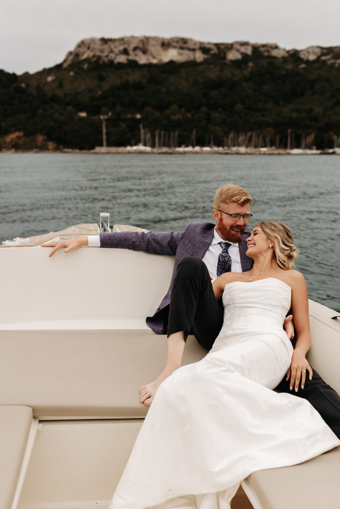 playful bride and groom moments on the boat during their sardinia elopement
