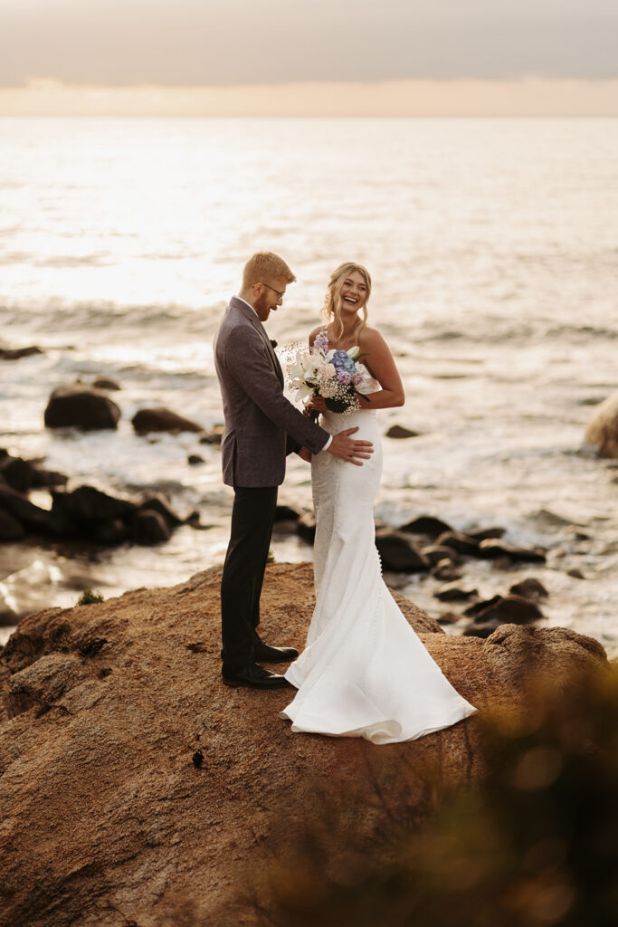 candid bride and groom elopement first look on a cliff in sardinia