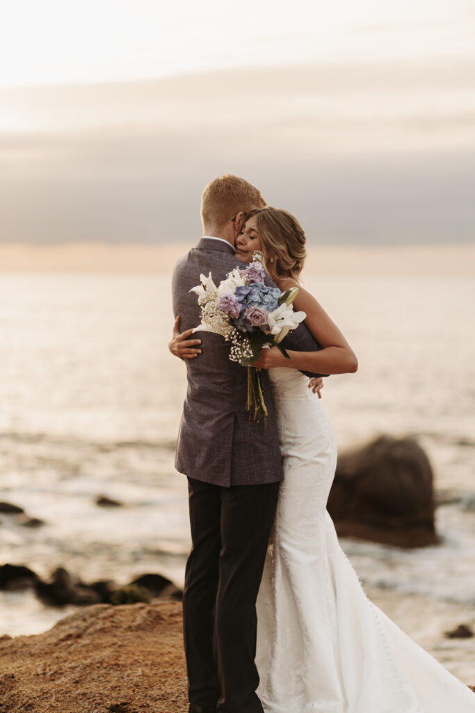 candid bride and groom elopement first look on a cliff in sardinia