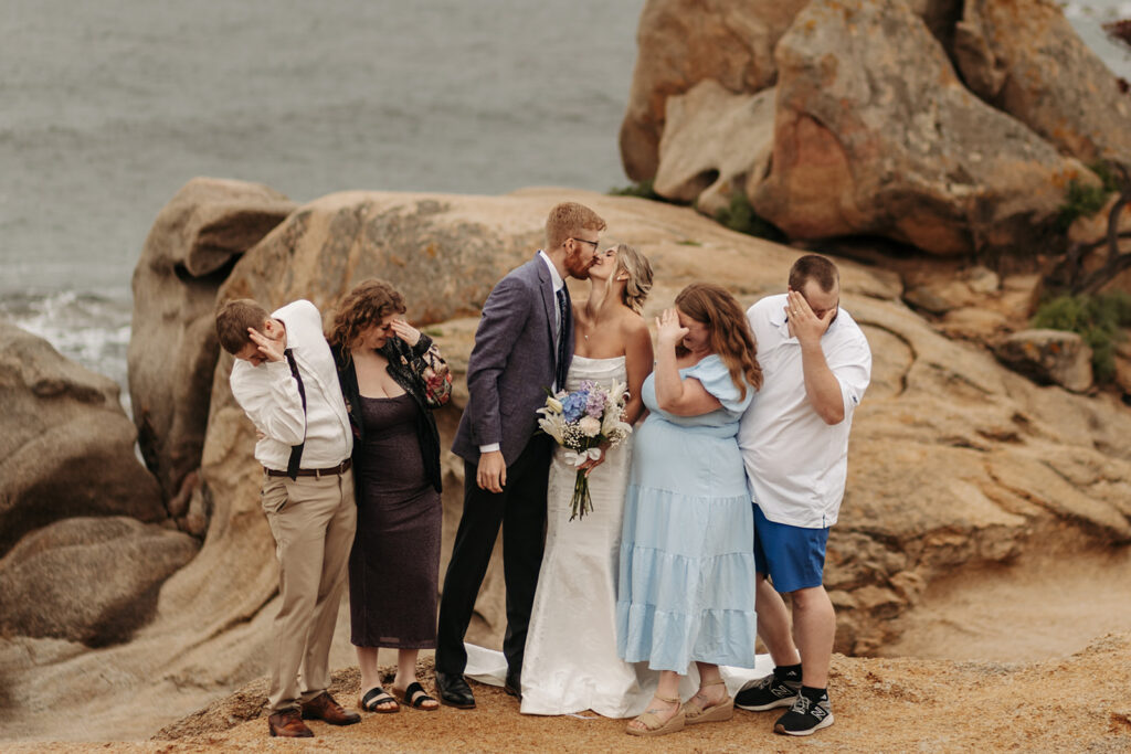 fun elopement couple with family 