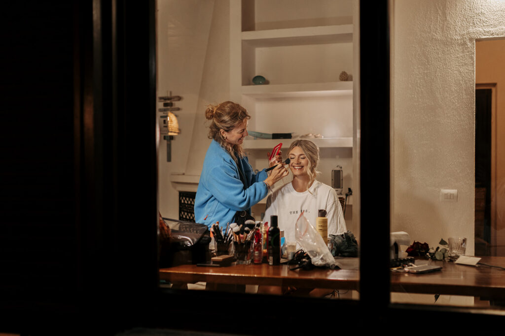bride getting ready at the airbnb