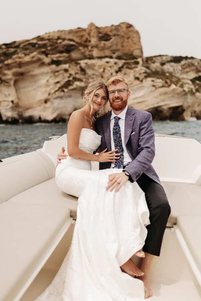 adventurous elopement couple enjoying a boat ride during their sardinia elopement
