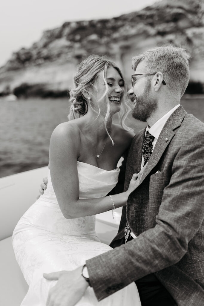 adventurous elopement couple enjoying a boat ride during their sardinia elopement
