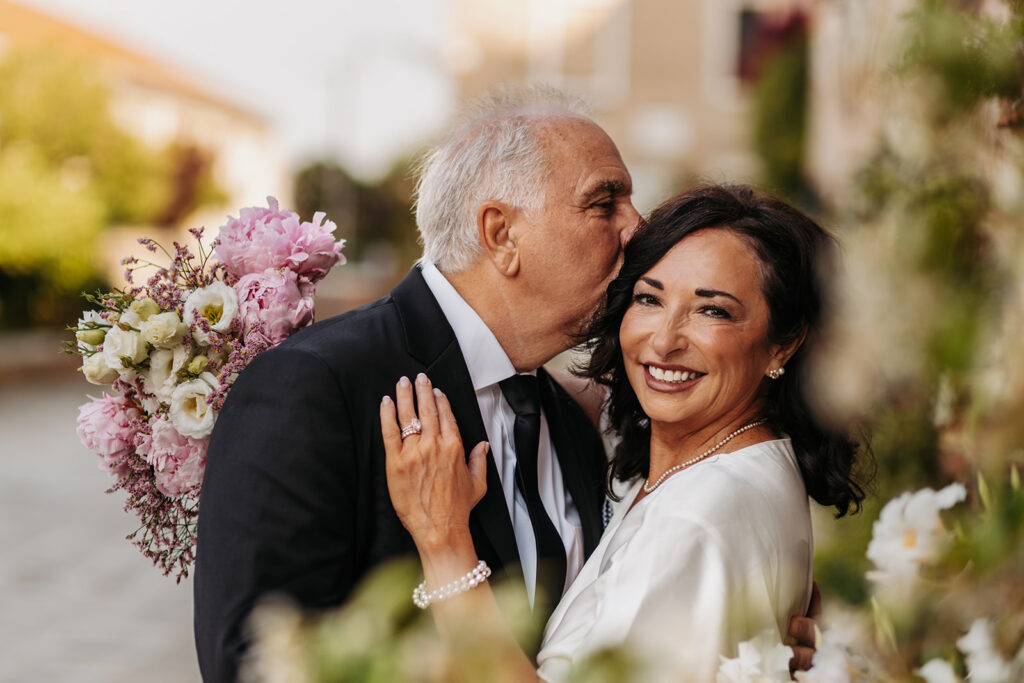 playful older elopement couple in venice, italy