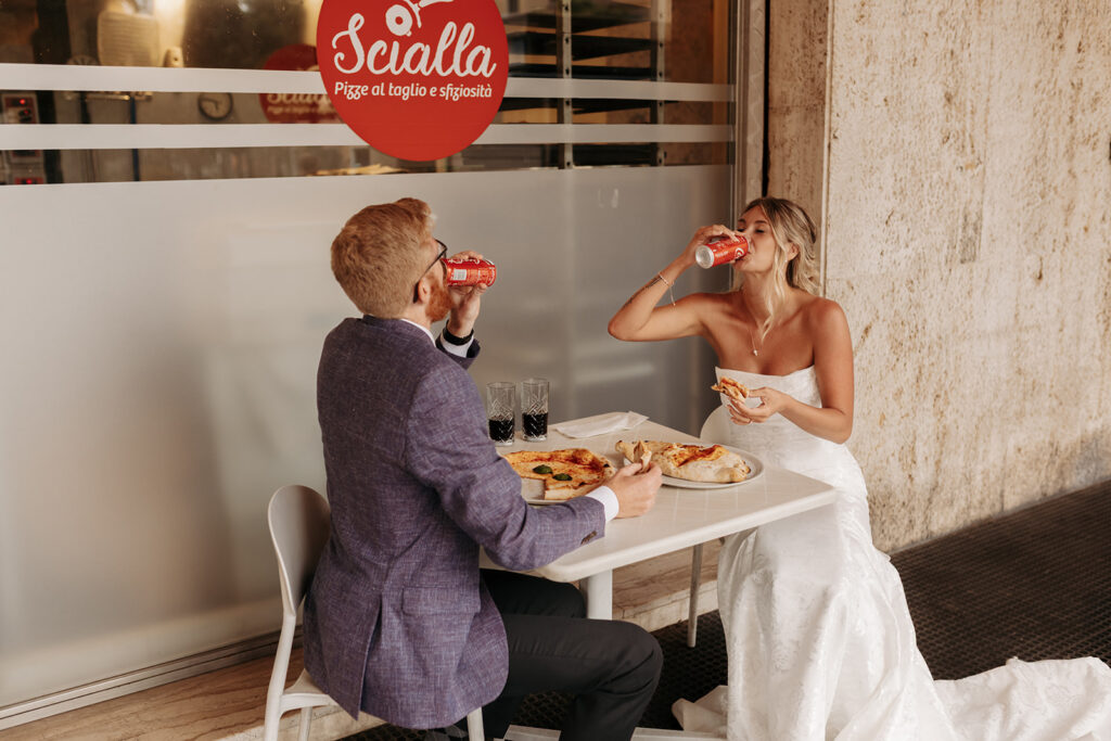 elopement couple enjoying drinks and pizza during their sardinia elopement in italy